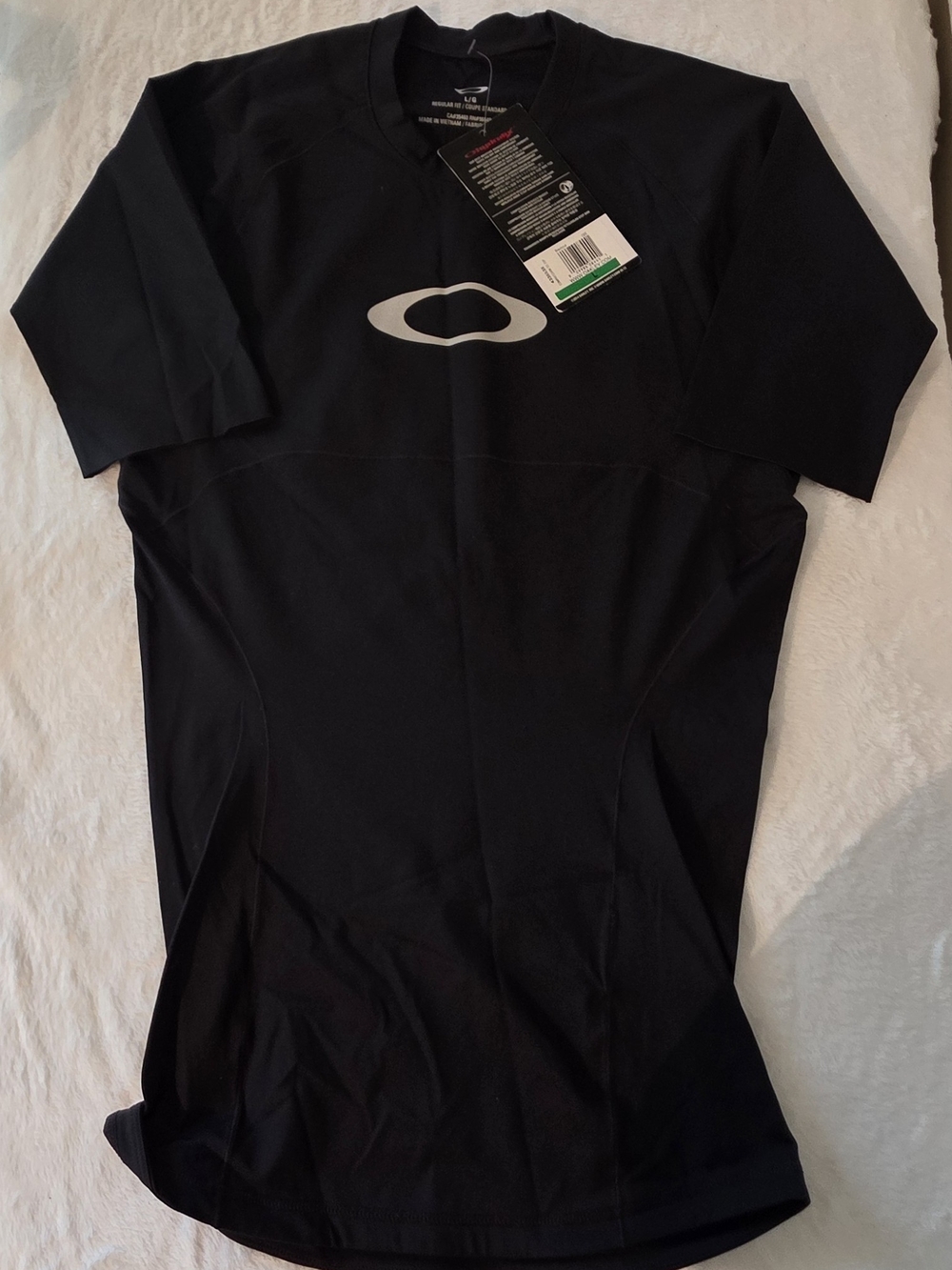 Oakley Black Short-Sleeve Performance Polo with Silver Logo